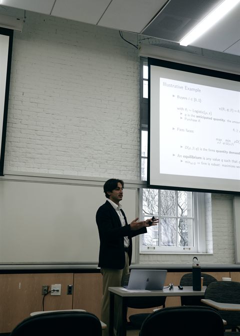 Adi Jahić presenting at the New England Economics PhD Conference